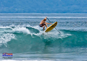 Robby Naish stand up paddle Costa Rica,  landing after some air